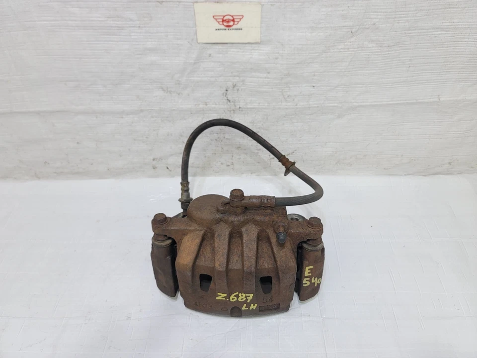 Pinza de freno delantera izquierda Lexus RX450h 2010-2015 OEM 47750-0E031 Foto 2 de 4