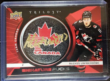 09/24   2023/24  TRILOGY TEAM CANADA SIGNATURE PUCKS. ALEXIS LAFRENIERE  TCSP-AL