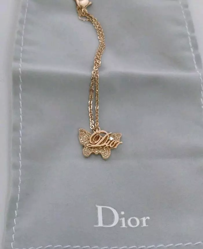 Bracelet Christian Dior logo papillon breloque bijou doré authentique sans boîte