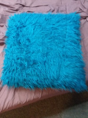 turquoise fluffy pillows