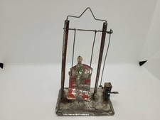 NICE 1920'S  GERMAN  TIN  HAND PAINTED  WIND UP  BOY ON SWING