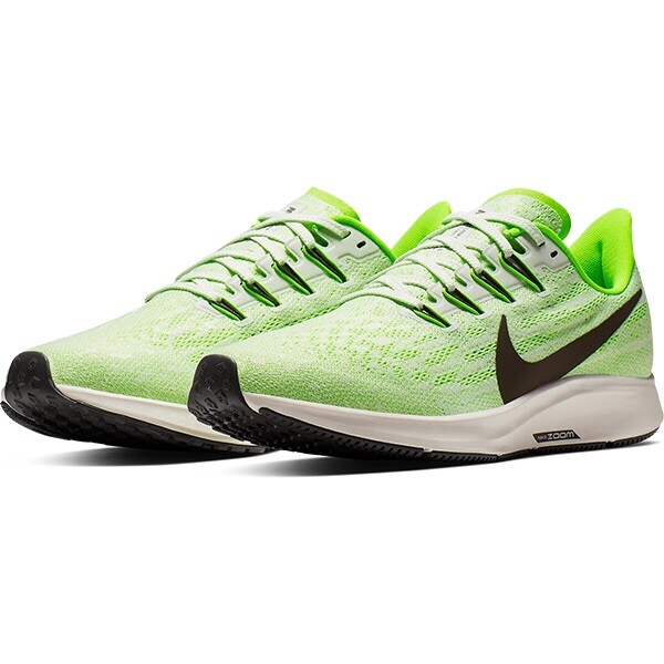 nike running air zoom pegasus 36 in green and white