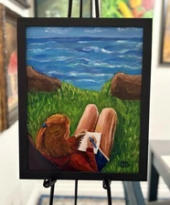 Girl On Grass Near Water writing, Painting 11 X 14”  Framed, Not A Print