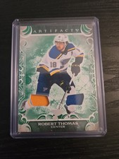 Robert Thomas 2024-25 Upper Deck Artifacts #26 Emerald Parallel 42/65 - Blues 
