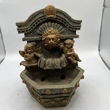 Heritage mint table top fountain Lion head with angels. Fountain
