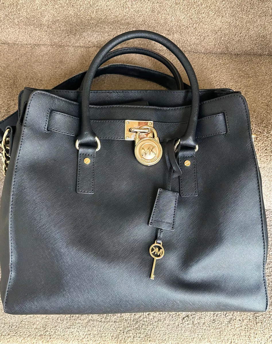 MICHAEL KORS BLACK LEATHER SATCHEL BAG WITH GOLD LOCK AND CHAIN MAGNETIC  CLOSURE