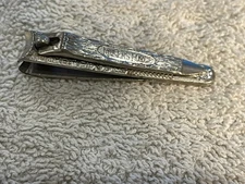 Vintage Art Nouveau Millers Forge Embossed Nail Clippers