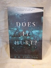 Does It Hurt? Paperback H. D. Carlton Like New!