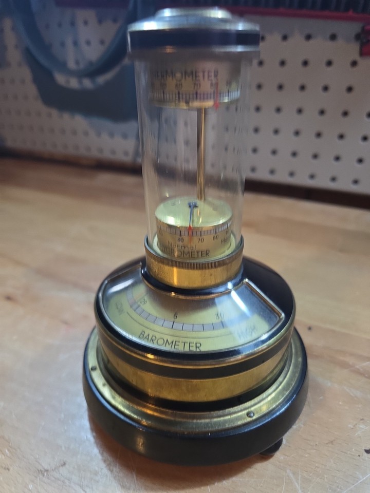 A stunning Lufft weather pillar combining barometer, thermometer, hygrometer, AND compass in one gorgeous antique tower — functional art.