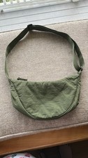 UNIQLO Round Mini Shoulder Bag in olive/khaki green.