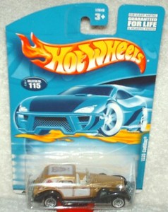 Hot Wheels 2001 # 115 1935 Cadillac gold/black fenders,ex.card,i combine ship