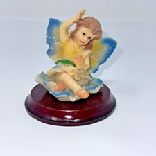 Vintage Resin Fairy Ballerina Brown Hair Blue Wings on Iris Figurine 3"x 3.5"