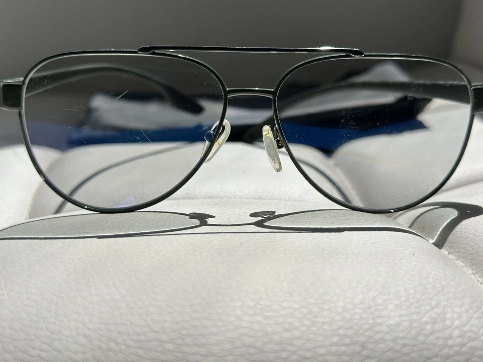 Солнцезащитные очки-авиаторы Prada Linea Rossa SPS 56 в черной металлической оправе с красной полосой б/у - Изображение 2 из 4