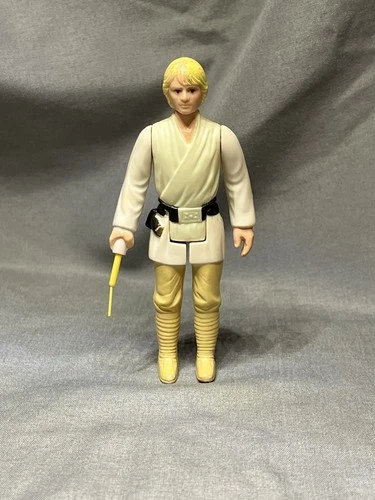 Kenner Star Wars 1977 Luke Skywalker Farmboy Action Figure with Lightsaber