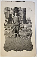 1907 to 1919 a young man with his bicycle. RPPC 5.5" x 3.5", NOKO stamp box
