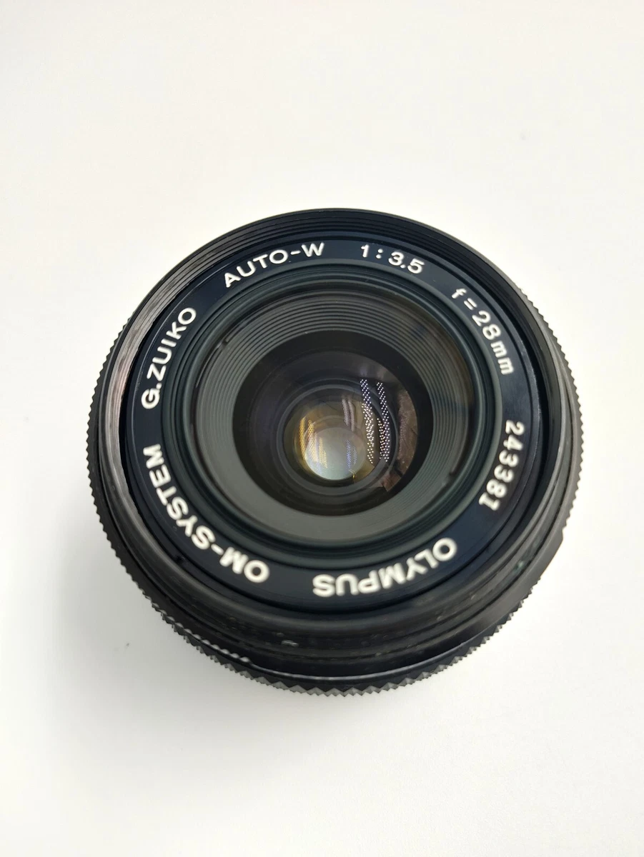 Objectif OLYMPUS Zuiko OM Auto 1:3,5 f 28 mm - Photo, audio & vidéo Objectif OLYMPUS Zuiko OM Auto 1:3,5 f 28 mm - Photo, audio & vidéo