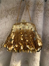 La Regale Gold Sequin Fringe Wristlet