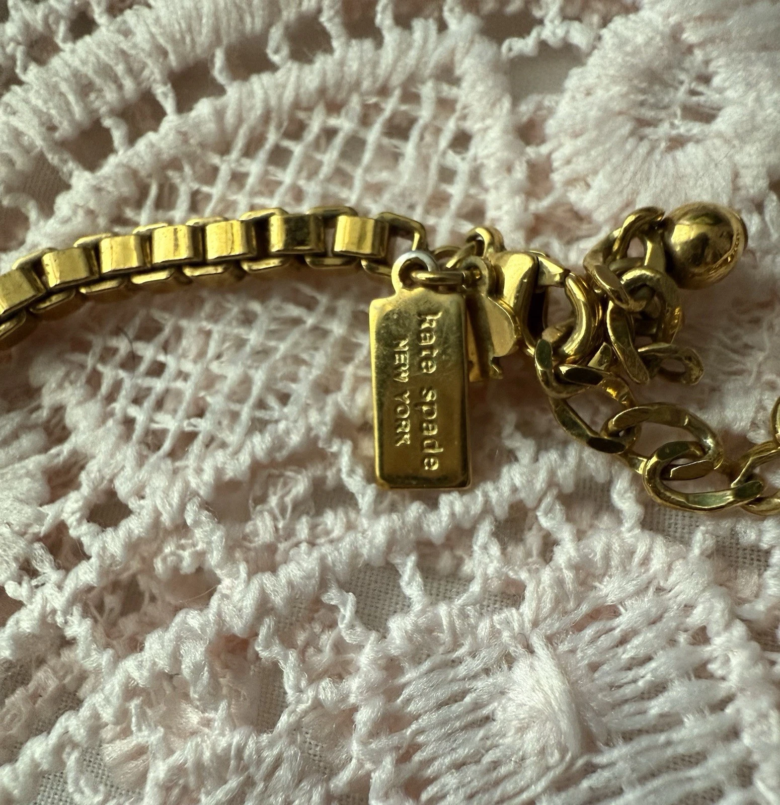 Collana girocollo 18 25 20 5” firmata Kate Spade catena tono oro crema strass