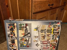 New 10211.  LEGO Creator Grand Emporium 10211 Box shows wear.  Discontinued.