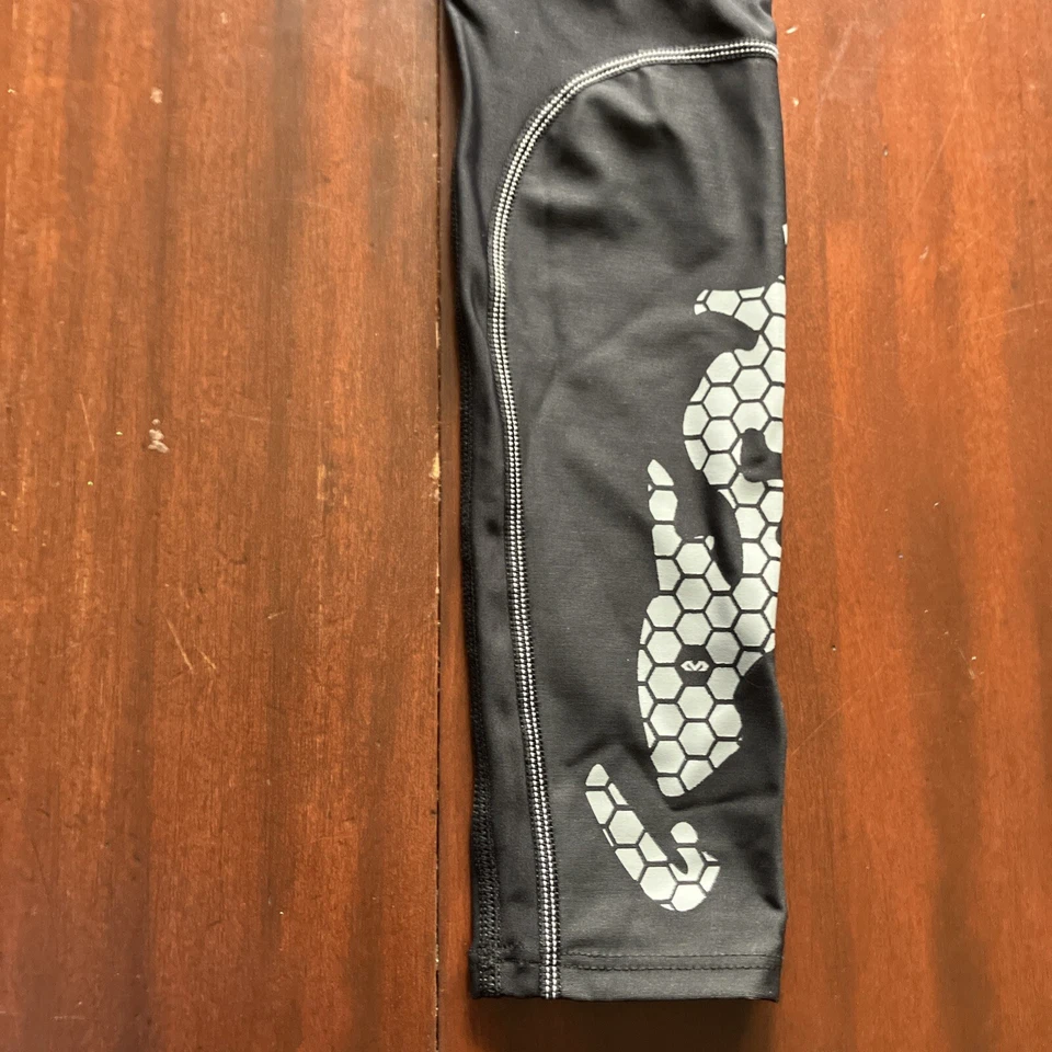 Medias de compresión McDavid para hombre talla pequeña negras entrenamiento capa base fútbol Foto 2 de 4