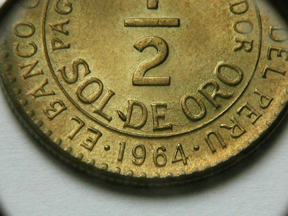 Moneda Perú 1964 1/2 SOL DE ORO AU+ con brillo tonificado y variedad de error (chips de troquel) Foto 4 de 4