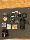 Minolta Srt 101 35mm Slr camera with 3 Lenses (58mm 1.4, 35mm 2.8, 75-300mm )