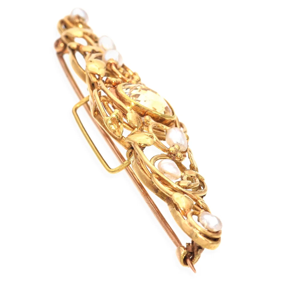 Broche antiguo de oro amarillo de 18 quilates Art Nouveau con motivo de vid de zafiro amarillo de 3 quilates Foto 2 de 4