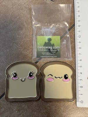 Spread It, Log It, Love It Geocoin -    Traube/Erdnuss - 2 Codes Unaktiviert