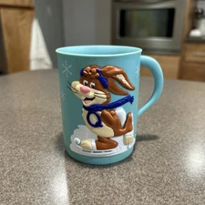 Vintage Nestle Nesquik 4" Plastic Mug Drinking Cup Ice Skating Bunny Rabbit Blue