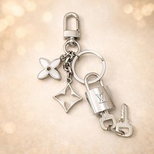 Authentic Louis Vuitton Silver Padlock Key with Unbranded Metal Bag Keychain