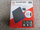 New WD My Passport Go External SSD, 1TB, W/ SanDisk 64GB USB 3.0 Flash Drive