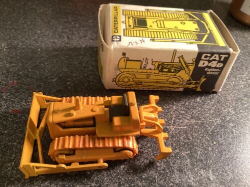 Caterpillar Bulldozer die cast in box. Rubber tracks. #120 D4d. Made in Germany