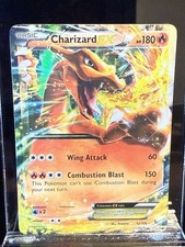 Charizard EX 12/106 Flashfire Holo on eBay