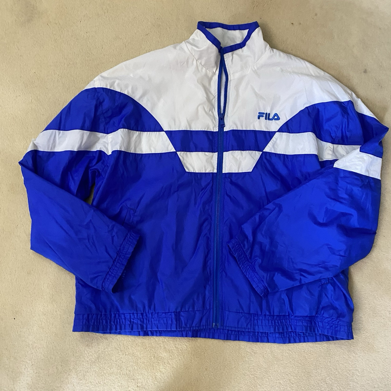 Giacca a vento vintage taglia L circonferenza petto 52 Fila Track Shell blu e bianca unisex