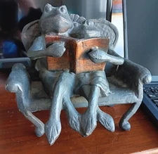 2 Frogs Reading a Book by SPI San Pacific International