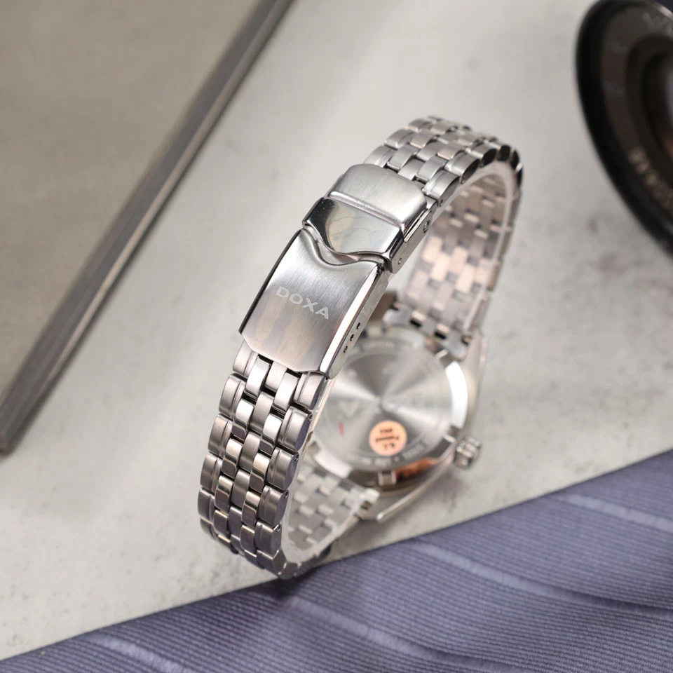 Reloj de cuarzo DOXA Damas Cara Blanca 12 Diamantes Rotos Impermeable D150SWH Foto 4 de 4