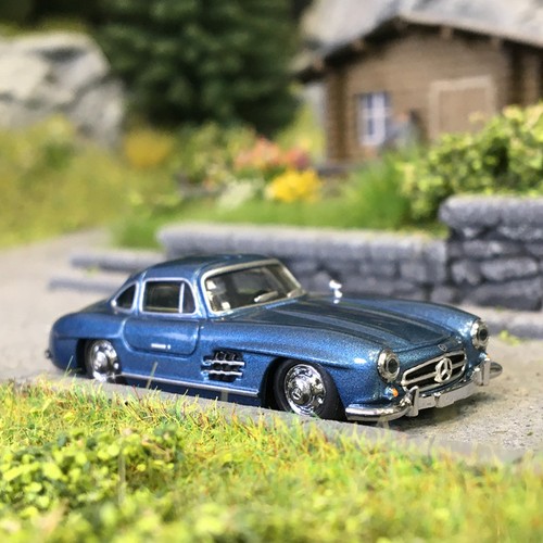 Mercedes-Benz 300 SL, portes papillon, bleu clair - HERPA 430975-002 - HO 1/87 | Zustand: Neuf