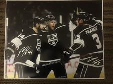 Autograph photo signed by Nate Thompson and Dion phaneuf.