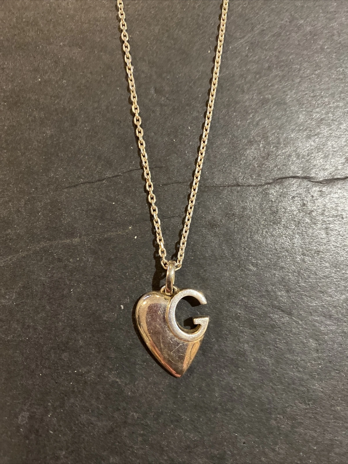 Collana con ciondolo GUCCI in argento sterling con logo cuore G
