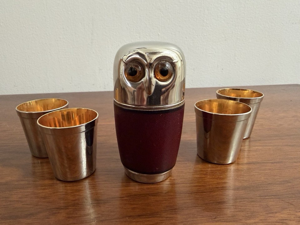 Mid-century owl motif leather-wrapped metal jigger and shot glass set is the kind of barware that stops a cocktail party cold — nobody has seen this before.