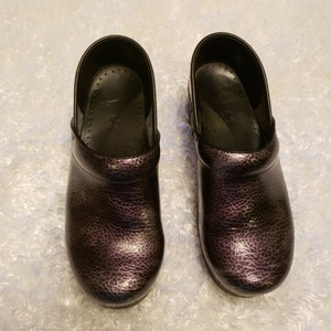 snakeskin dansko clogs