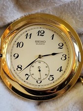 NICE RARE VINTAGE SEIKO QUARTZ 7N07-0010 POCKET WATCH GOLD TONE...SIZE 42 MM.