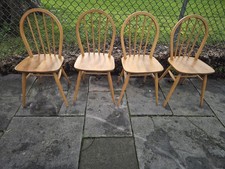 Set of four Ercol Windsor Hoop Back Dining Chairs. Blonde