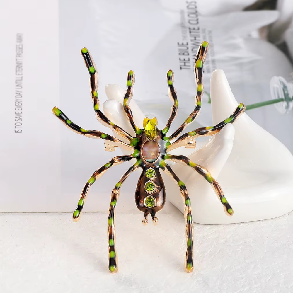 Large vintage gold tone rhinestone spider brooch pin