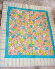 Handmade Quilt 44 in x 55 in multicolored 2 inch squares pastels multiple prints