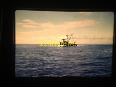 3T18 VINTAGE Photo 35mm Slide SMALL BOAT ON OPEN CALM WATERS BLUE CLOUDY SKIES 