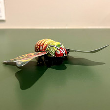 Juguete mariposa de fricción de estaño ALPS, hecho en Japón, años 50 vintage