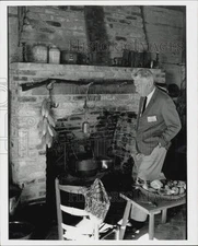1973 Press Photo Travel author Harry Harman by Louisiana plantation fireplace