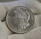 1885 O US Morgan Silver Dollar $1 AU (Cleaned)
