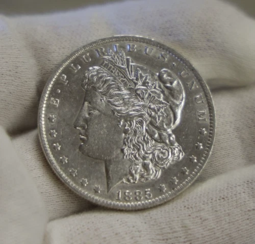 1885 O US Morgan Silver Dollar $1 AU (Cleaned)